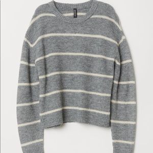 Divided grey sweater